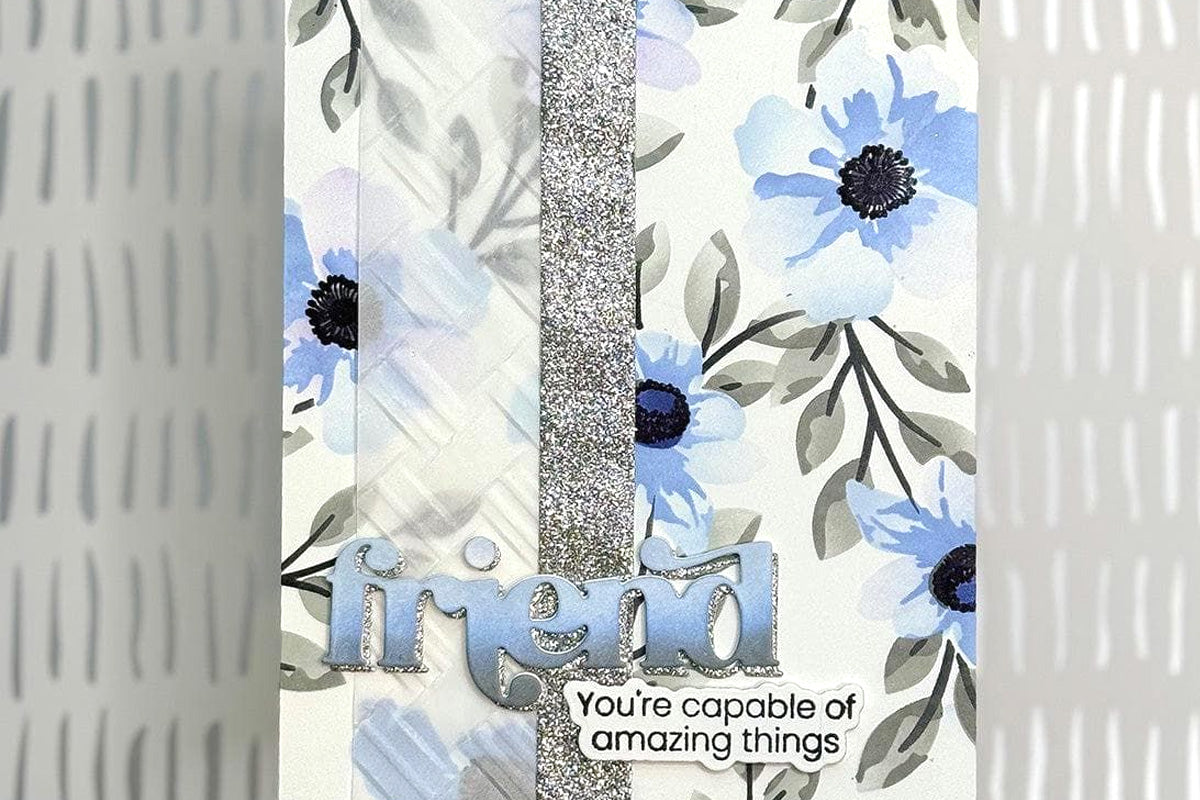 A friendship card with a lovely background of blue flowers and embellished with Altenew's Moonlit Silver Glitter Tape