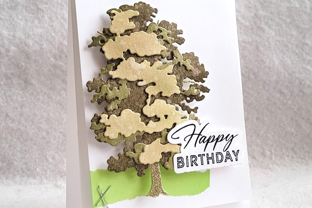 Handmade birthday card with a 3D chestnut pine tree created with Altenew layering dies featuring its key-hole crafting system