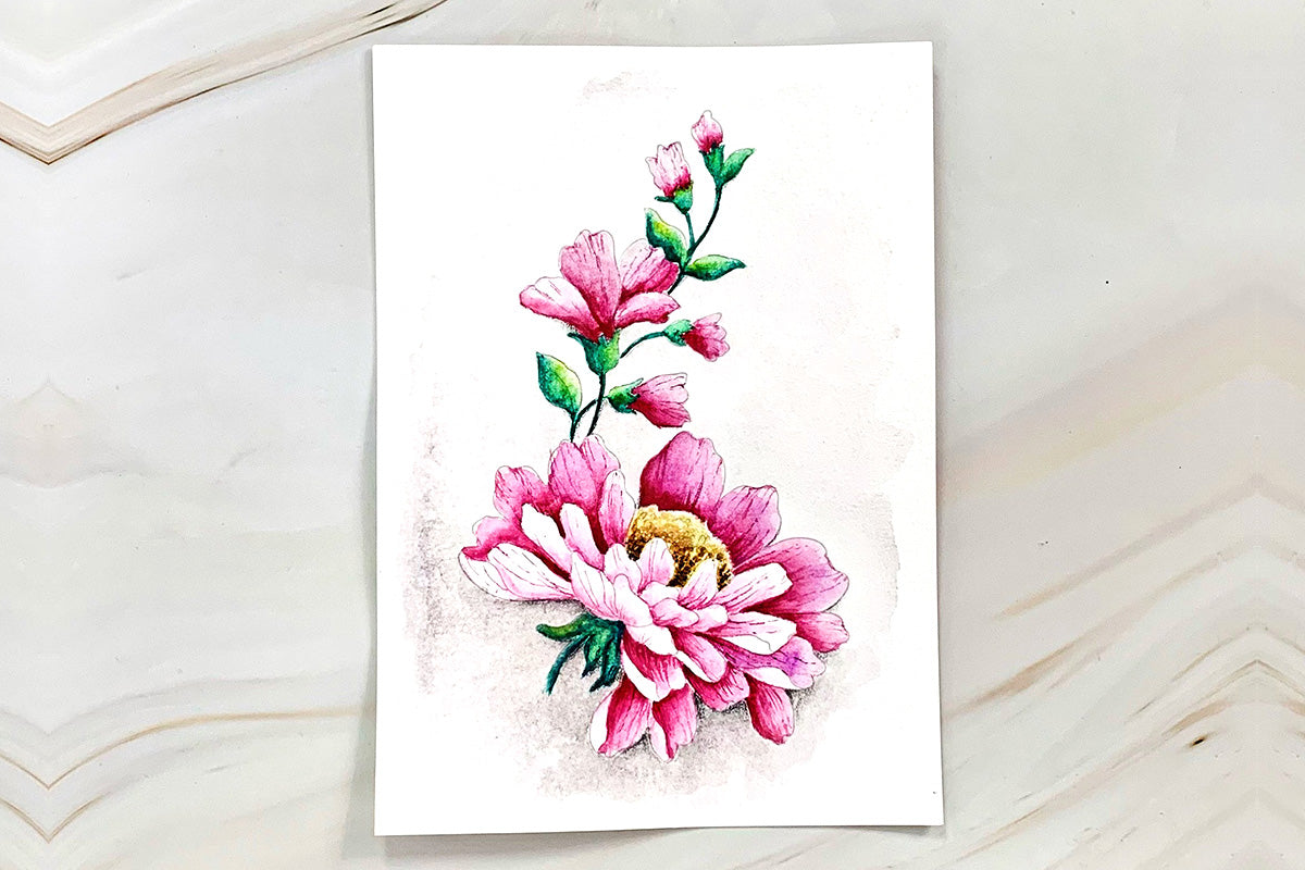 A page out of Altenew Watercolor Coloring Book featuring a floral image painted using Altenew Watercolor 36 Pan Set