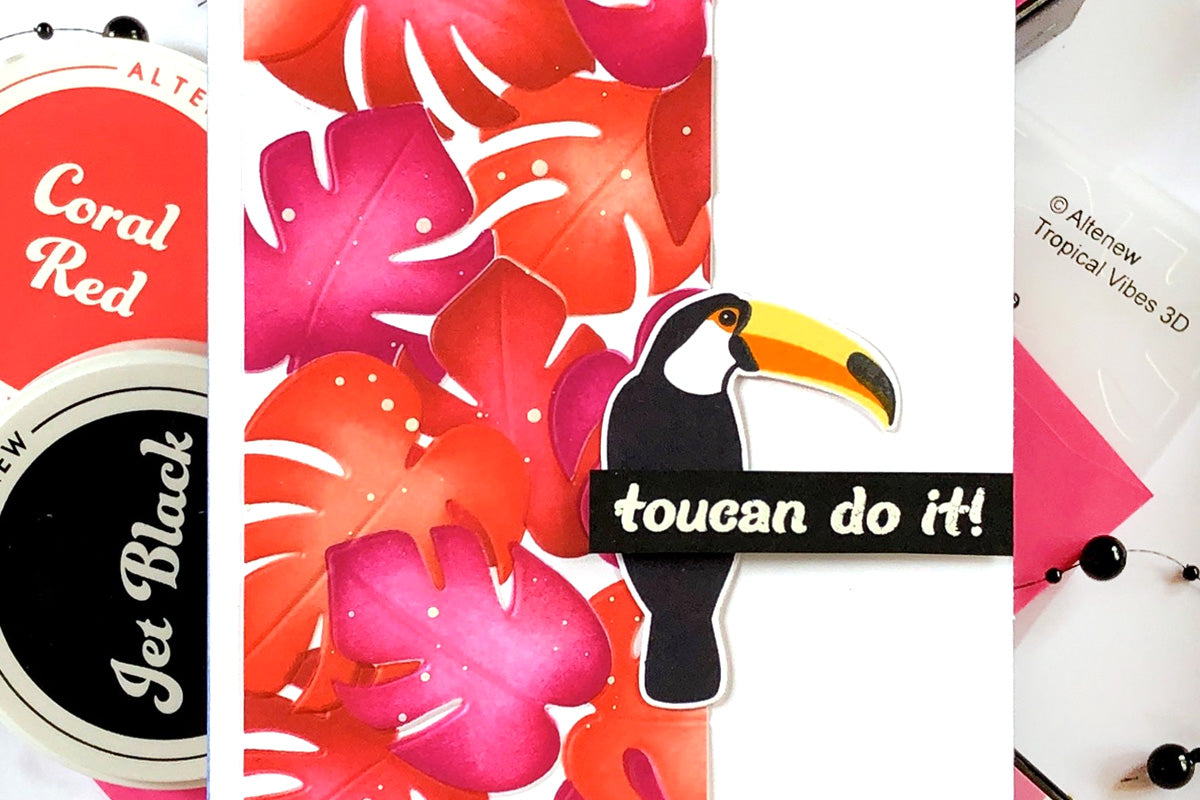 A tropical toucan card filled with red and orange hues