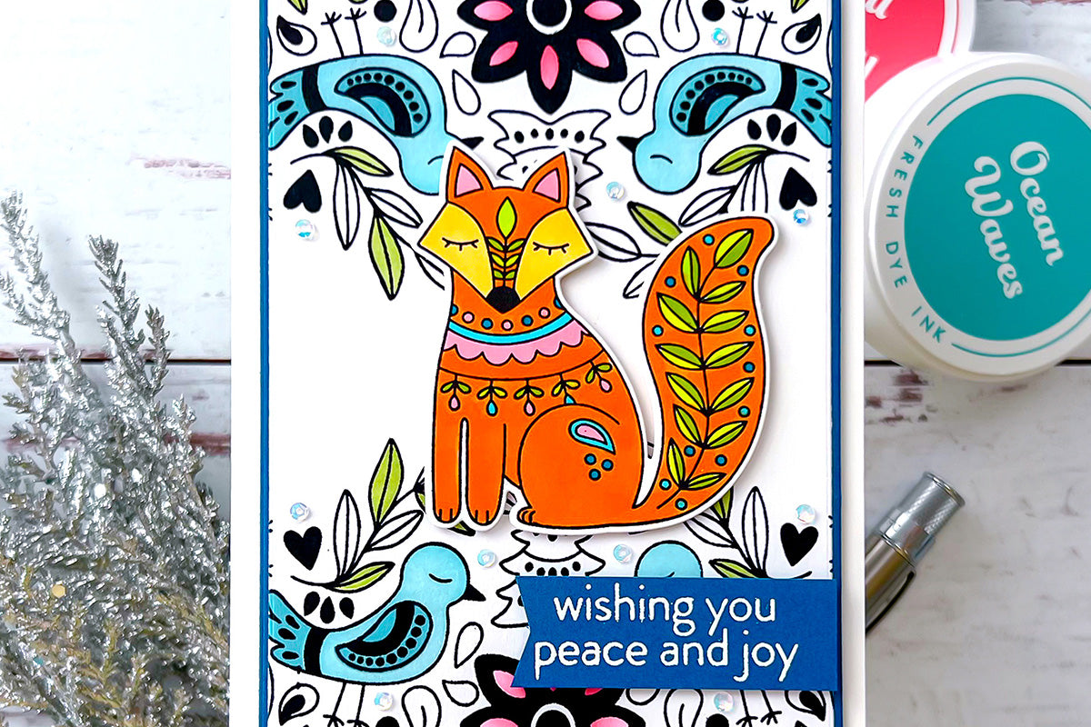 DIY Christmas card featuring a Nordic fox and designs, made with Christmas card making kit for adults
