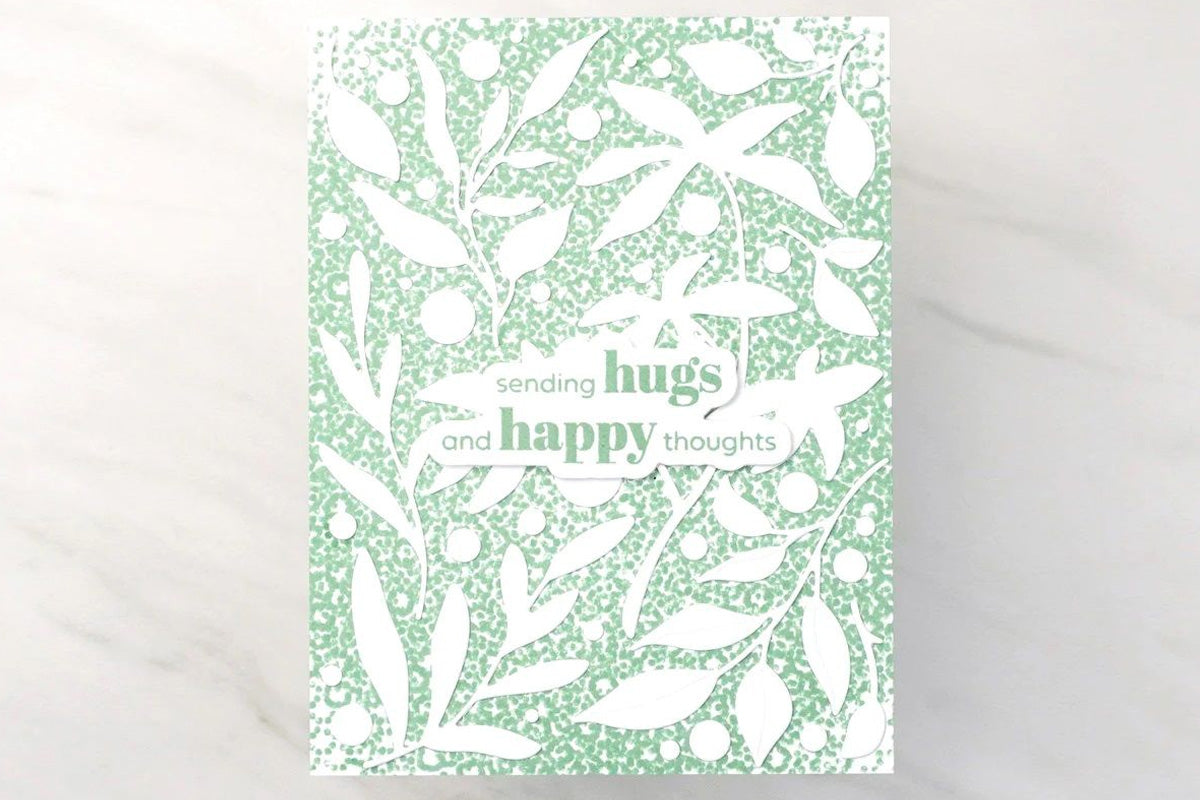 A "sending hugs and happy thoughts" card using the new Zero-Waste cover die series from Altenew