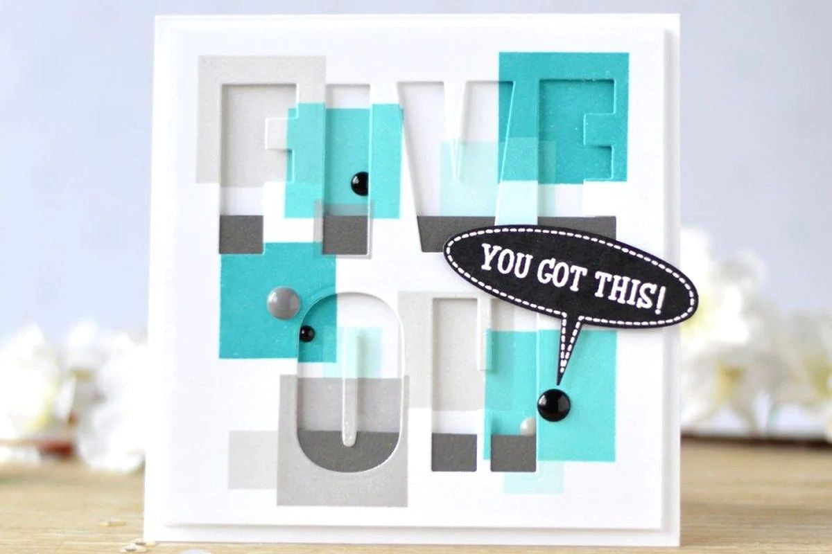 A "Five Oh" card created with the hidden die-cut technique, with a little twist using the "negative" of the die-cuts