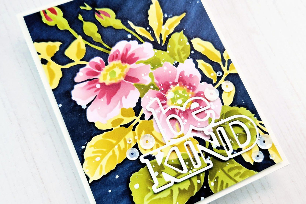 A "Be Kind" floral card created with the in-lay die-cutting technique