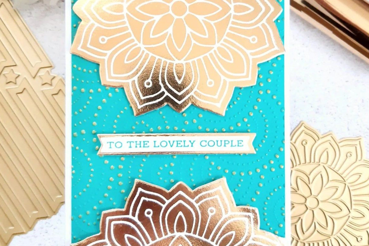 A wedding card with a gold-and-sky blue motif, created with the Sunburst Doily Hot Foil Plate & Die Set