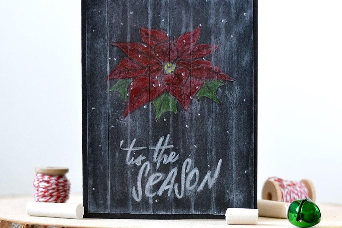 Black cardstock technique using stamps and white pigment ink