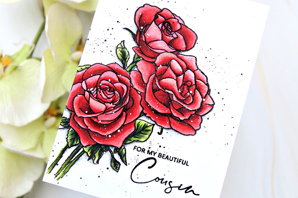 Clean and simple handmade floral card with stamped roses, colored with red alcohol markers