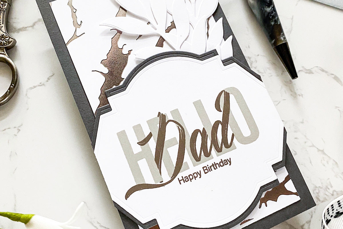 Birthday card for dad with white foliage die-cuts and foiled elements