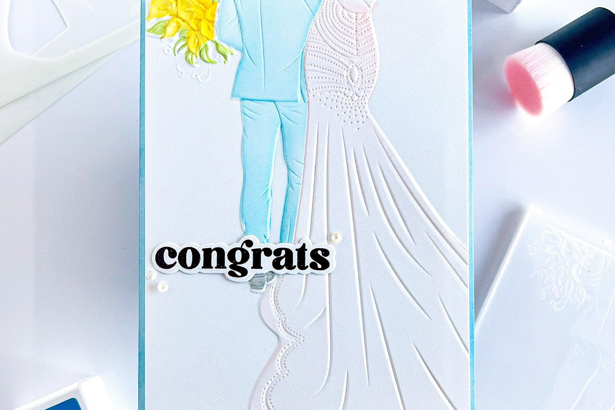 Simple wedding card idea with a 3D embossed image of a bride & groom's back view