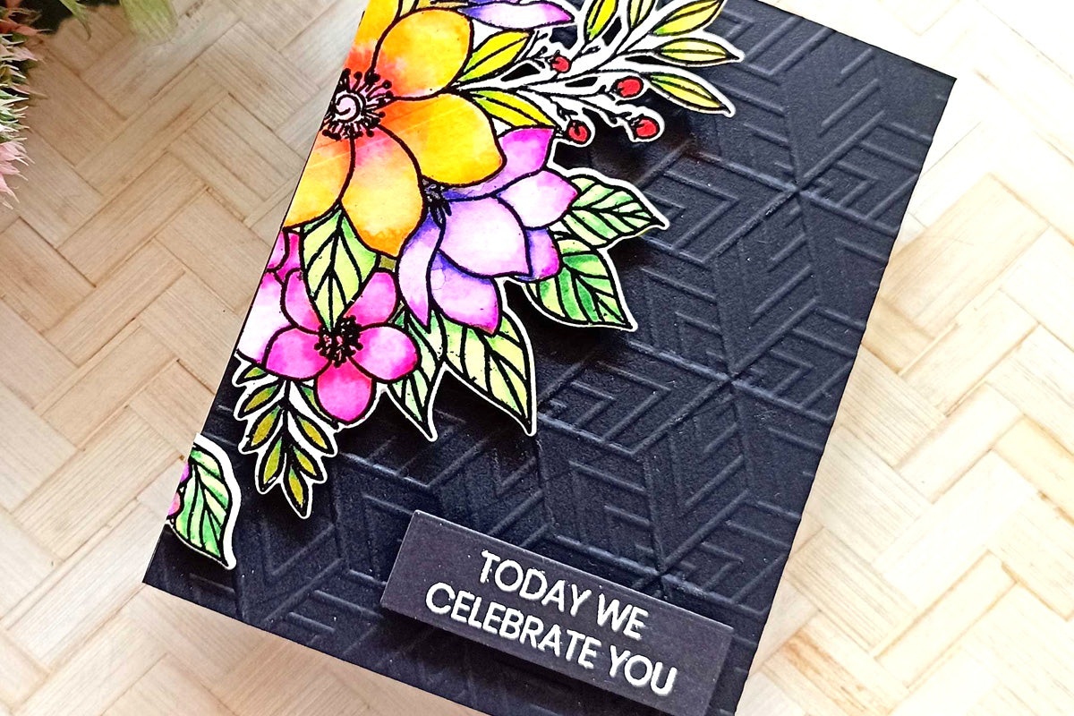 A "Today we celebrate you" appreciation card with a floral design focal point on black cardstock 3D-embossed with geometric lines