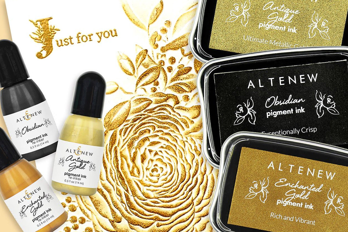 Altenew's pigment inks and re-inkers alongside a card with a golden, 3D embossed floral background