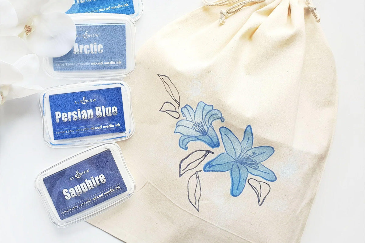 A knapsack with a lovely floral print of blue flowers, created with Altenew's pigment inks