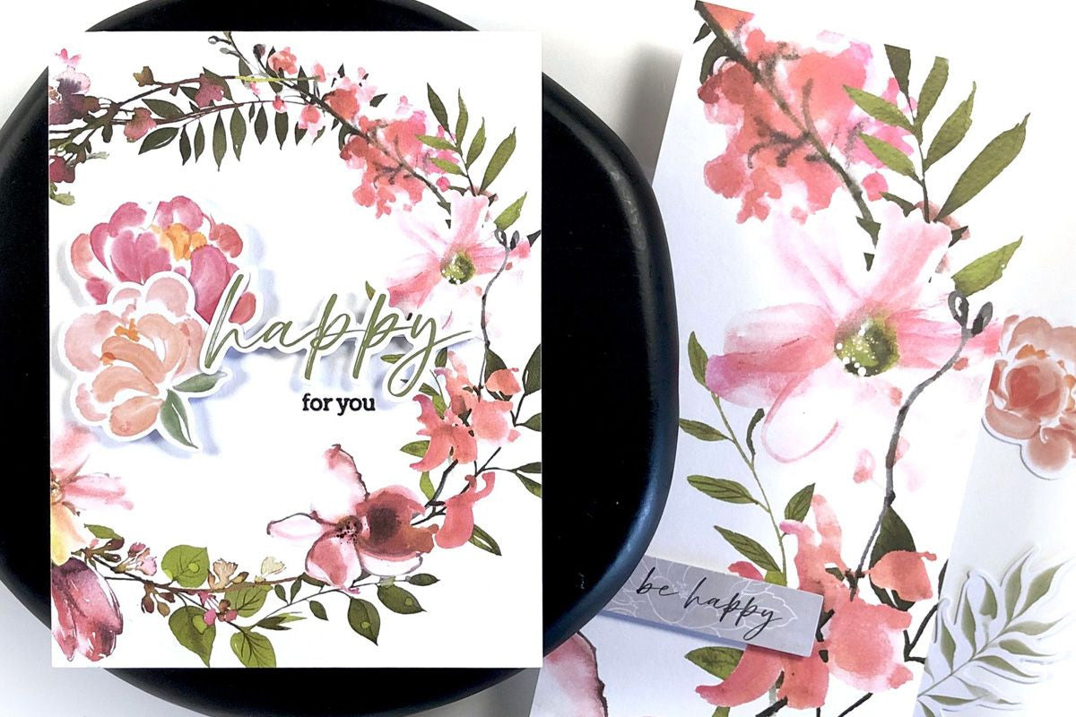 2 handmade greeting cards decorated with fussy cut florals and foliage from washi tapes