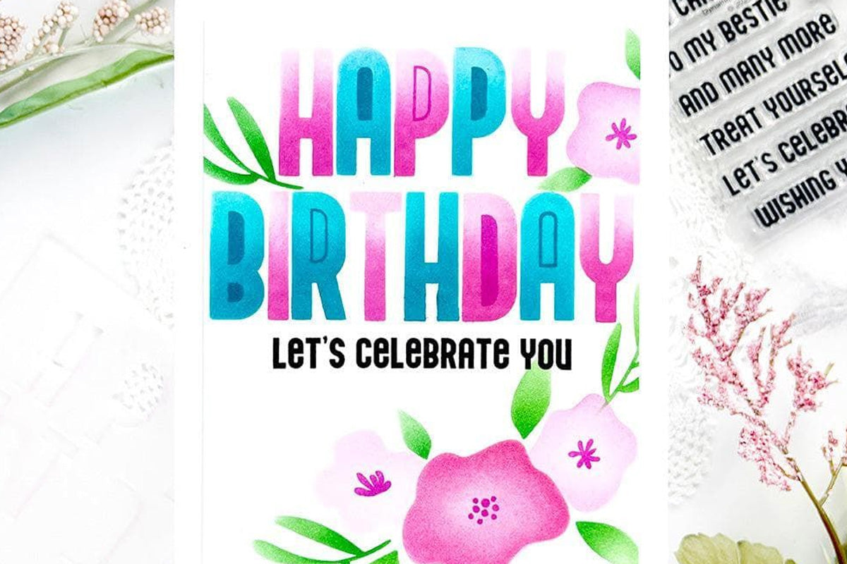 Colorful floral handmade card made with alphabet stencils