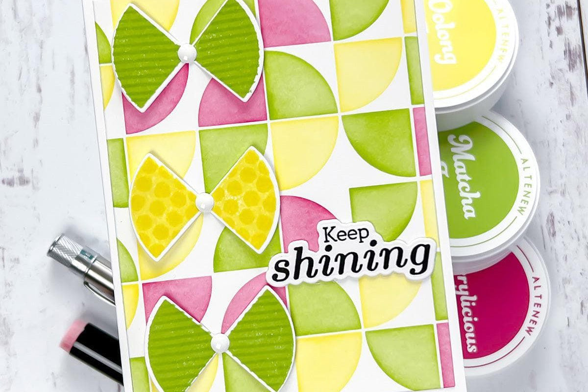 Colorful handmade card with geometric shapes made with builder stencils