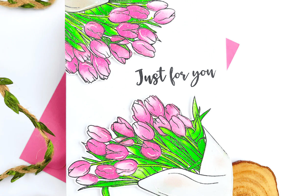 Pink tulips on a handmade card, made with Altenew tulips coloring stencil set