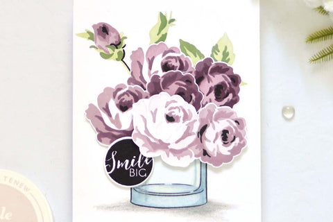 Beautiful handmade card with a bunch of roses on a vase and the sentiment "smile"
