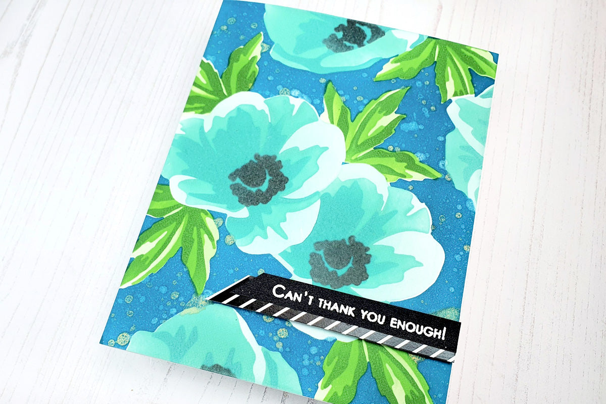 Easy homemade thank you card with stenciled anemone flowers on a blue background