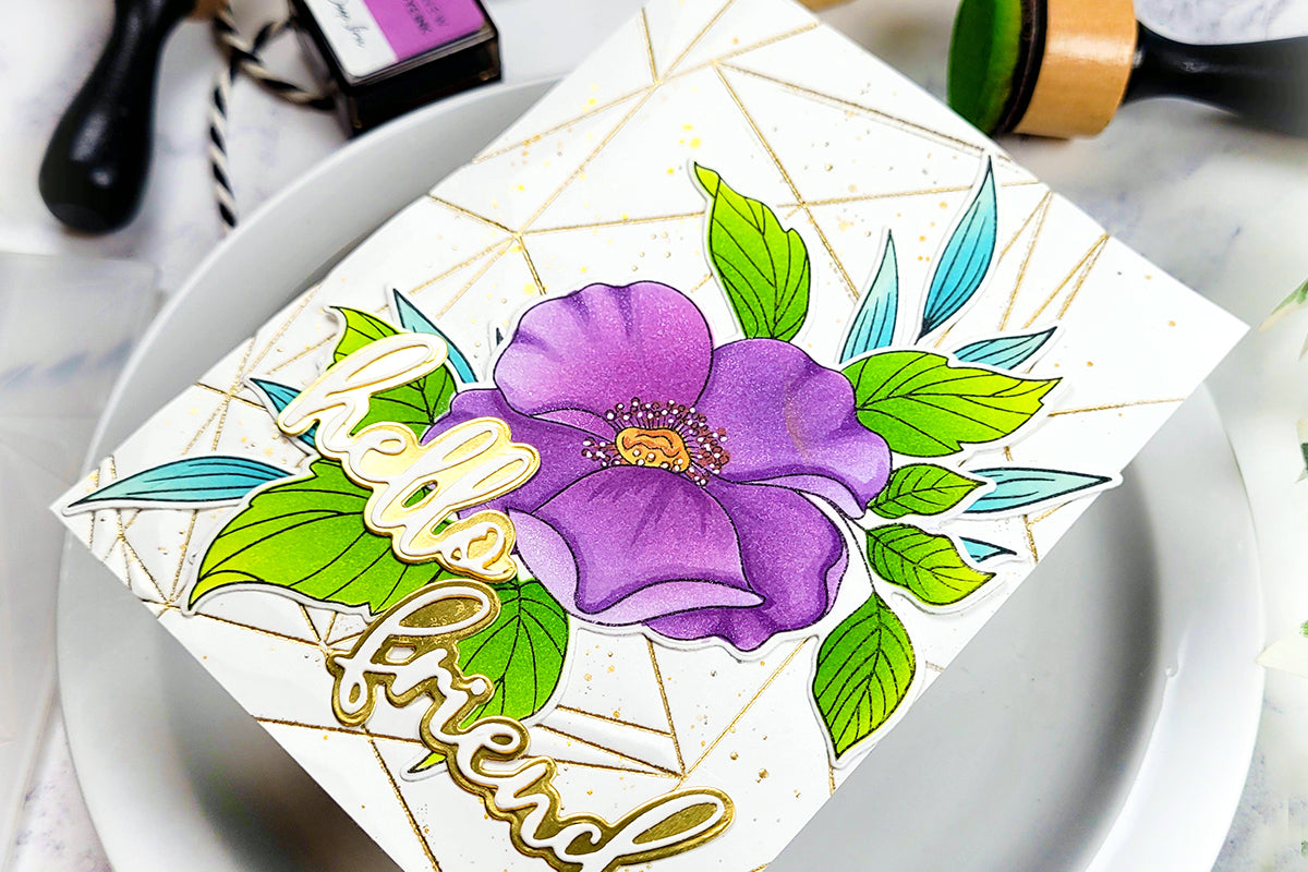 An amazing card by Kelly showcasing gorgeously-colored floral images, with heat-embossed gold sentiments