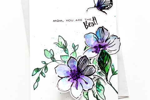 Quick and easy Mother's Day card with watercolored hibiscus, leaves, a butterfly and a stamped sentiment