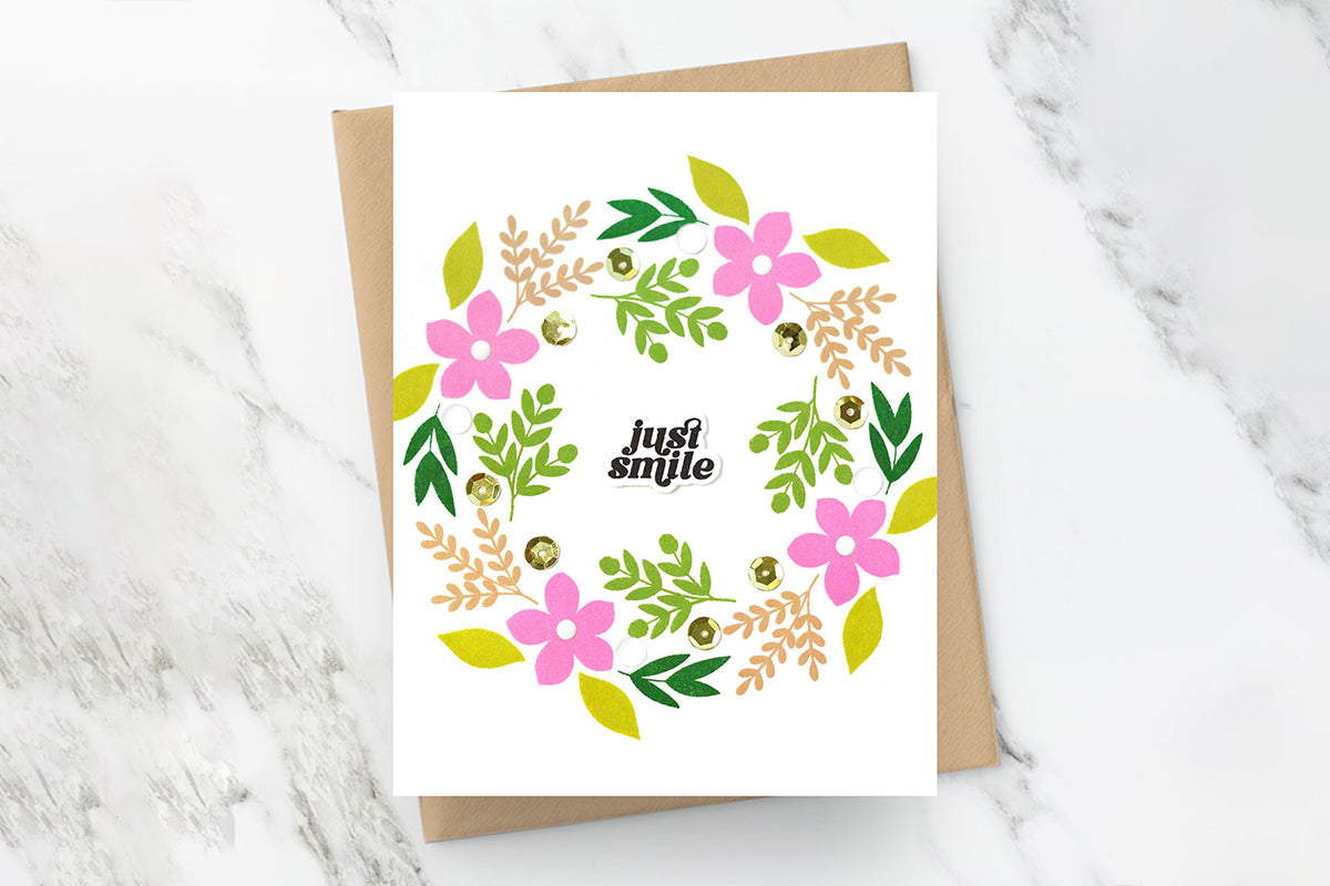 Fun and whimsical wreath design on a handmade greeting card