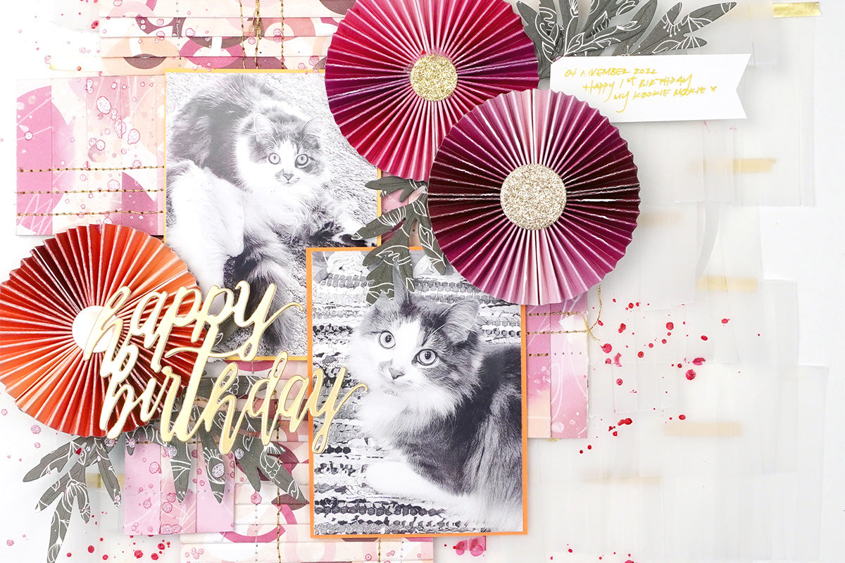 A cute cat scrapbook page idea with paper pleating and stitching