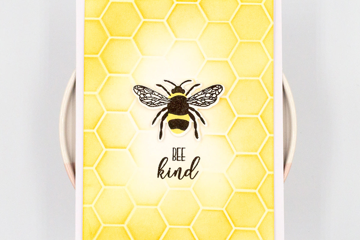 Cute card idea featuring a yellow beehive background and a bee die-cut image