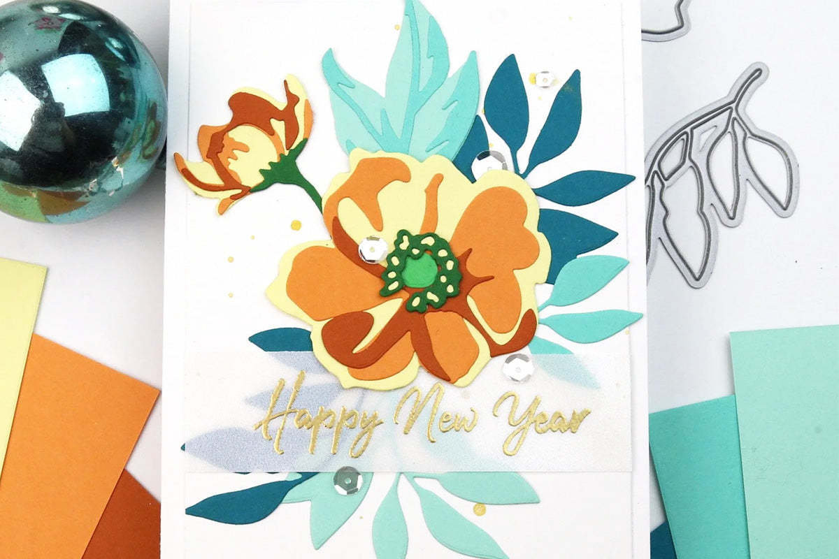 A New Year greeting card with die-cut floral and nature elements from colored cardstock sheets