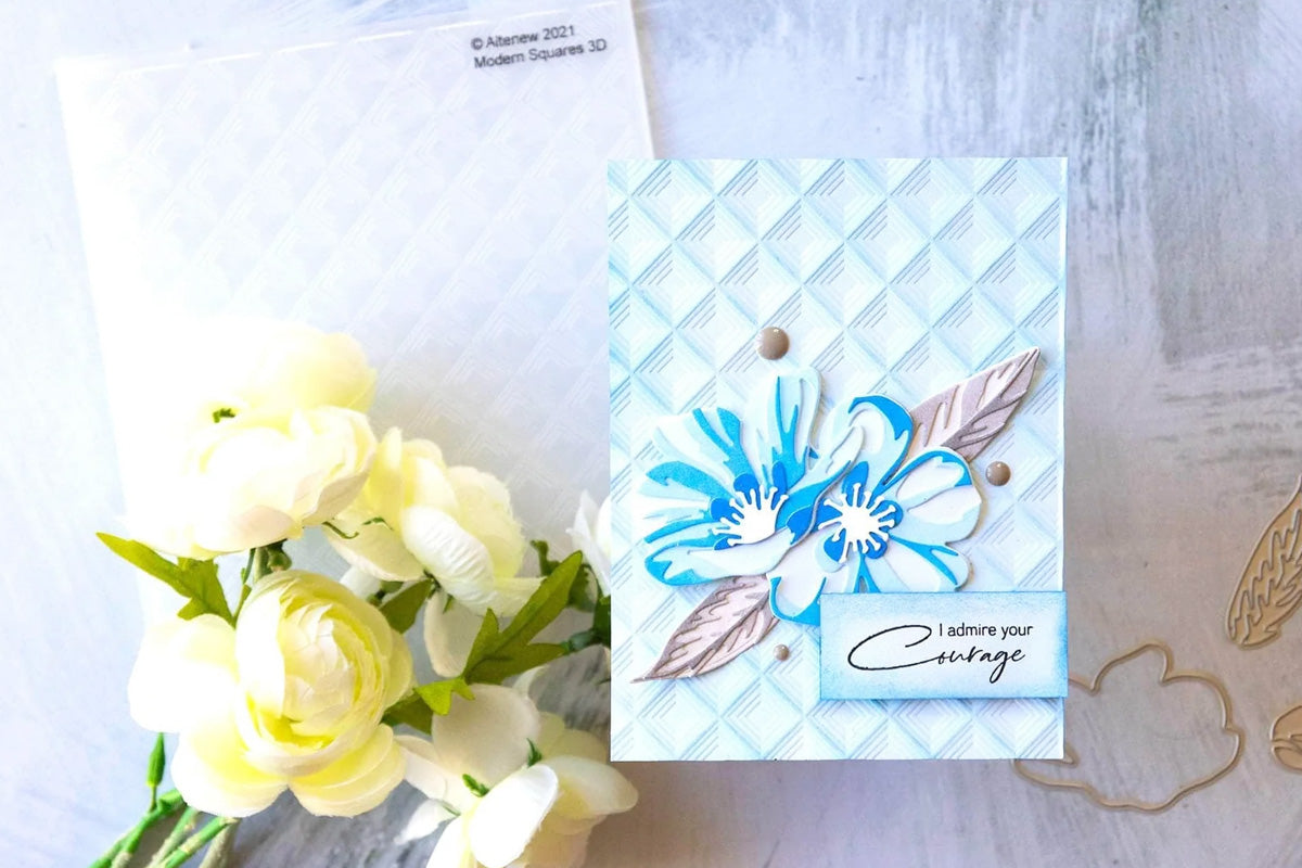 An "I admire your courage" greeting card made with blue-colored cardstock. blue dye ink, and a 3D embossing folder