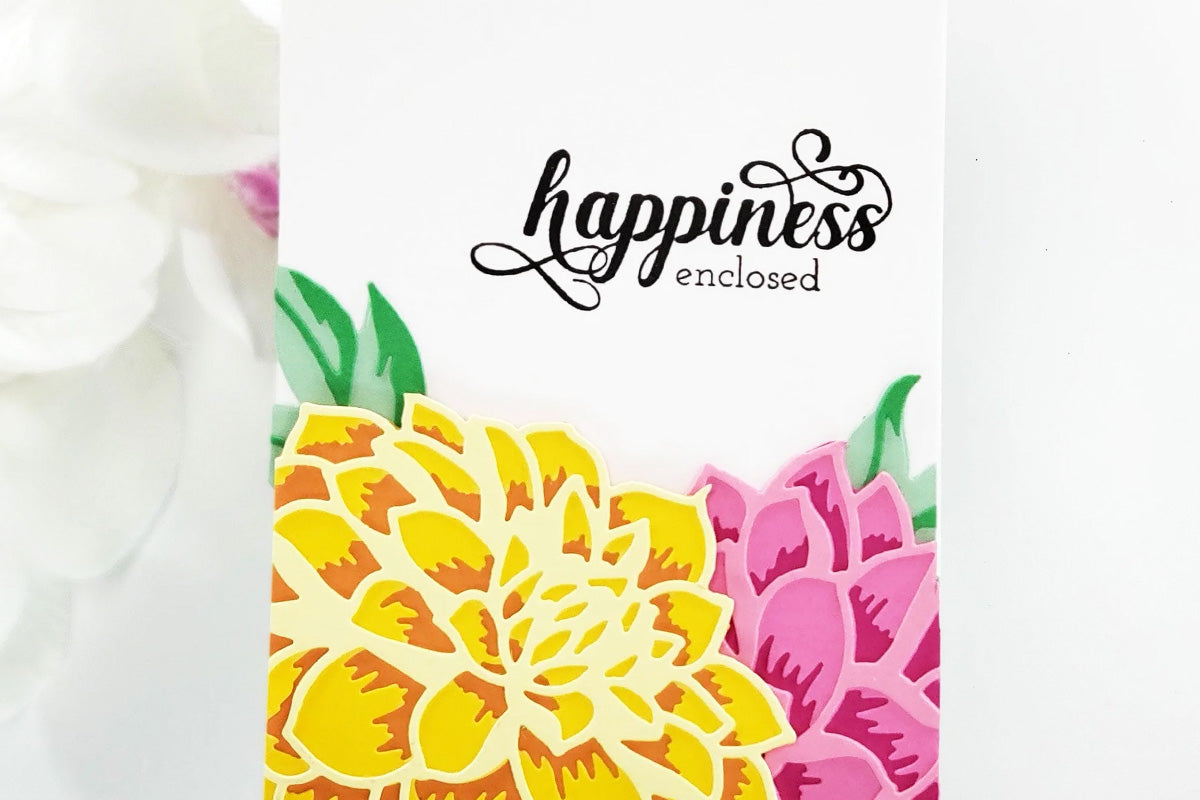 A "happiness enclosed" card with a blooming florals as a background, created from die-cut colored cardstock