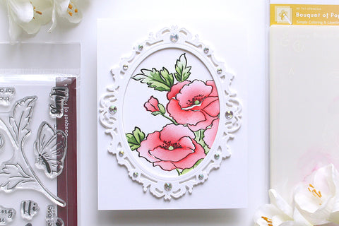 A clean-and-simple card designed with the Sparkled Frame Die and a simple background bouquet of poppies.