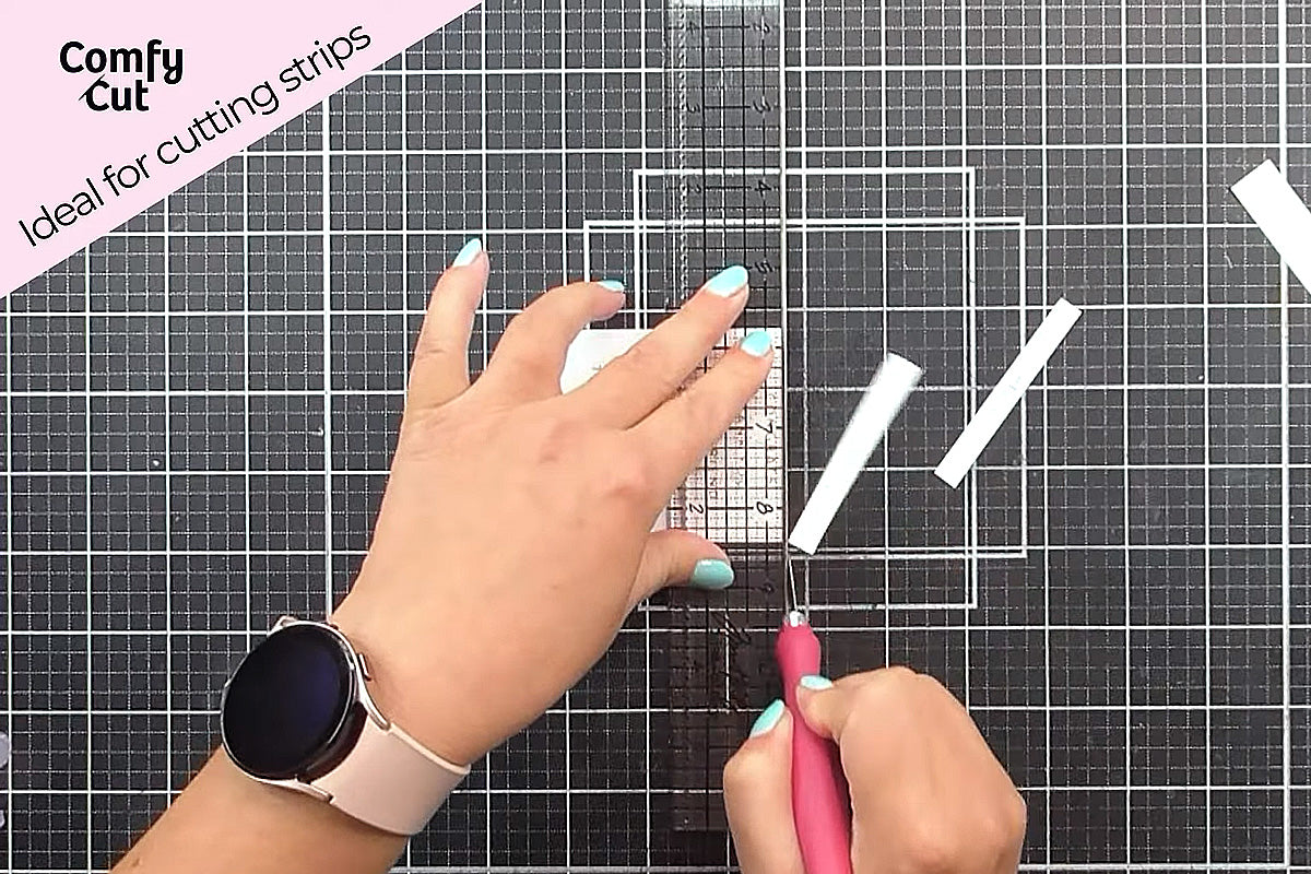 Using a ruler to cut out sentiments with the Comfy Cut Ergonomic Craft Knife