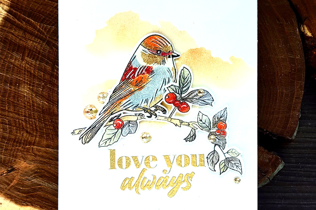 A nature themed anniversary card with a bird perched on a leafy branch, made with Altenew's Rustic Charm card kit