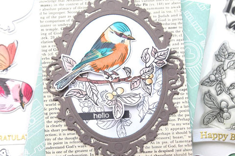 Beautiful handmade greeting card with a mirror frame and a bird in the middle