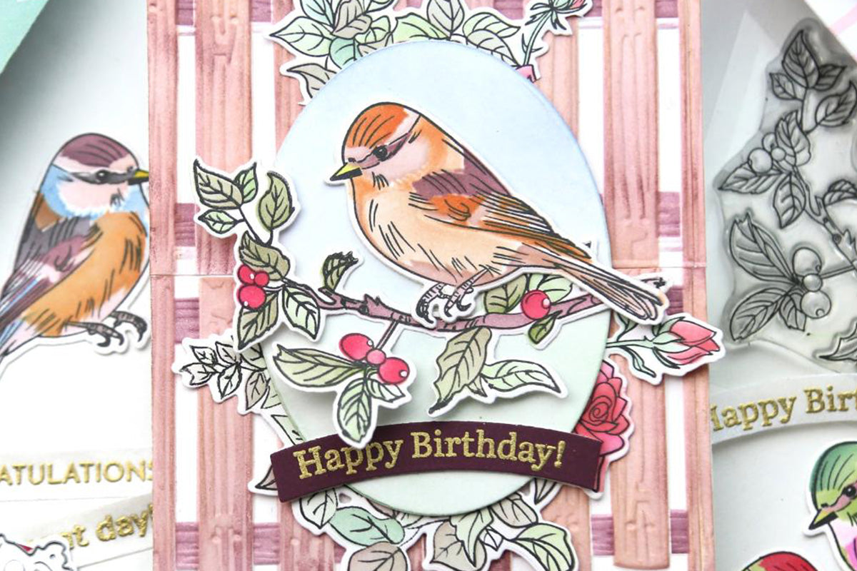 Handmade birthday card with a 3D embossed wooden fence and a bird perched on a fence