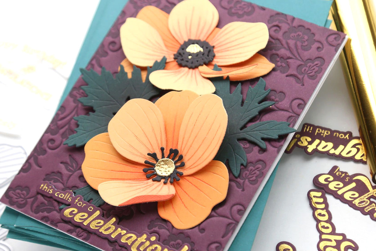 Celebration themed floral card with a green card making envelope from Altenew