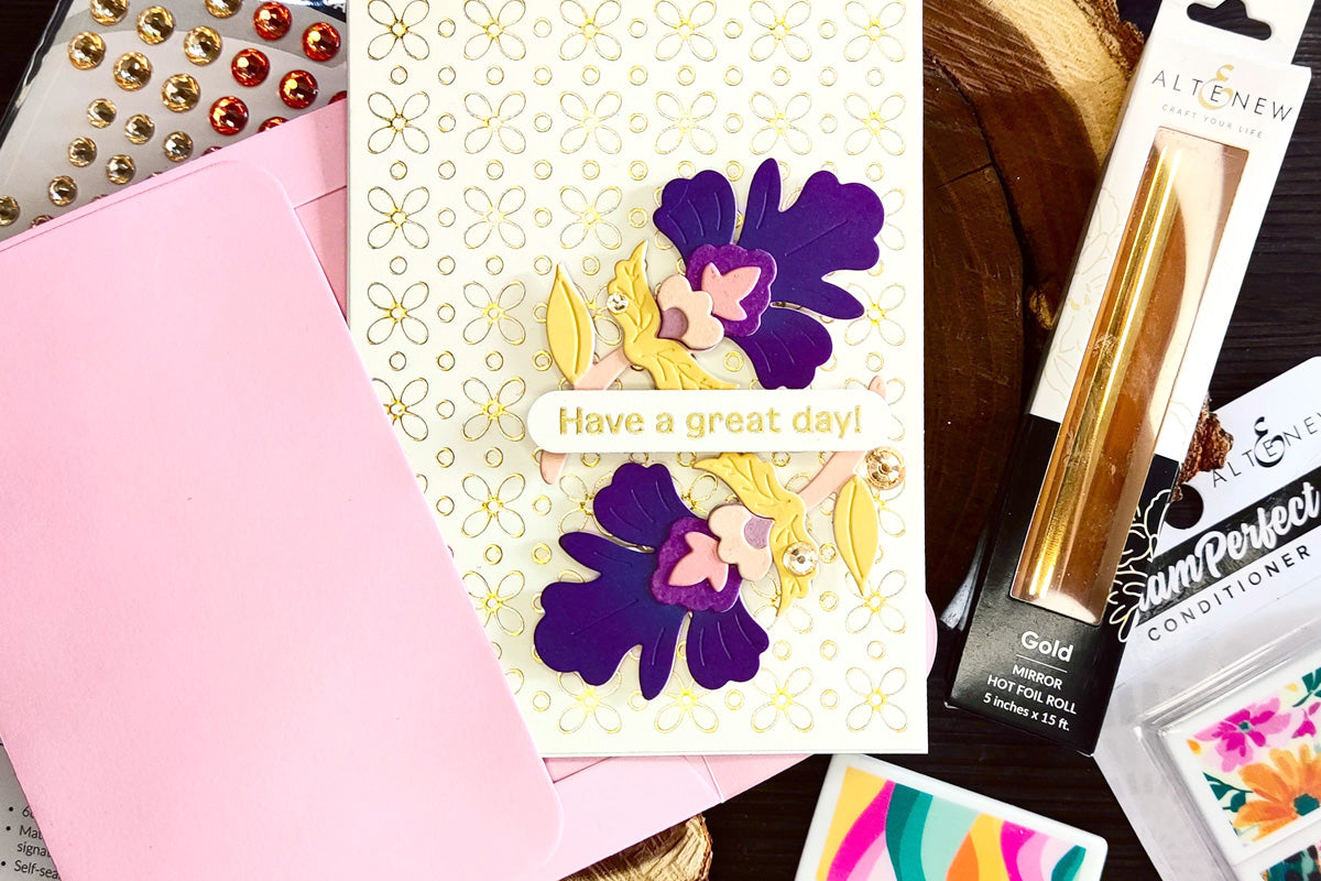 handmade greeting card with a gold foiled background and a matching pink card envelope from Altenew