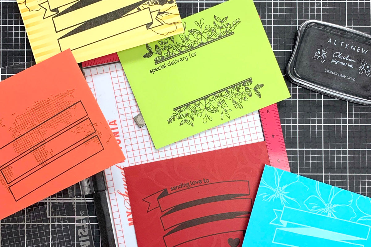 DIY greeting card envelopes decorated using Altenew's Envelope Art Stamp Set