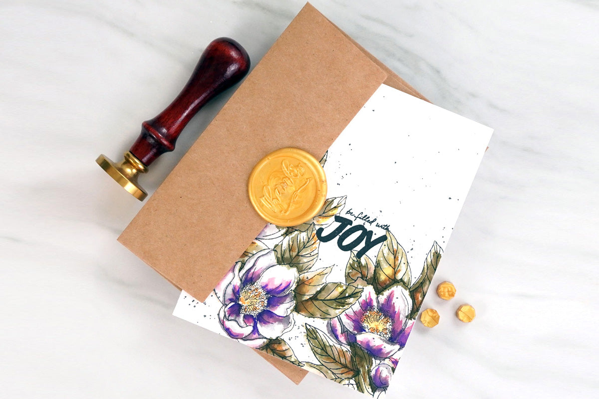Floral handmade card with a Kraft envelope and a gold wax seal stamp