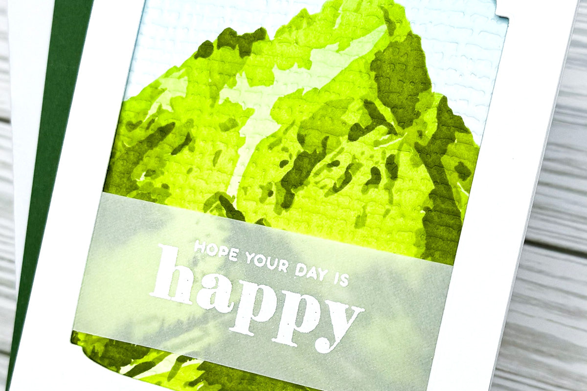 Nature-themed greeting card with an image of a  mountain and added burlap letterpress background