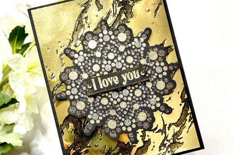 Elegant Valentine's Day card idea with a gilded marble letterpress background and a gold mandala design