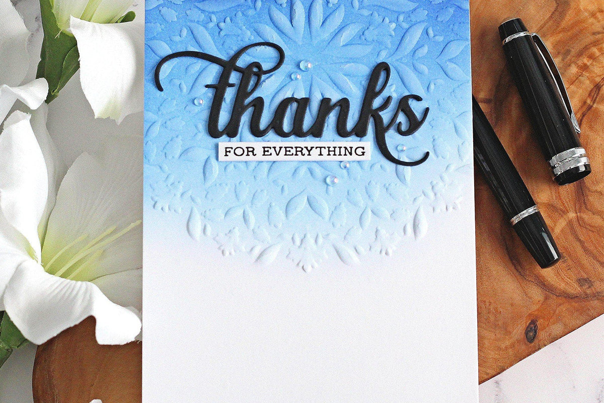 Masculine thank you card with a partially embossed mandala design