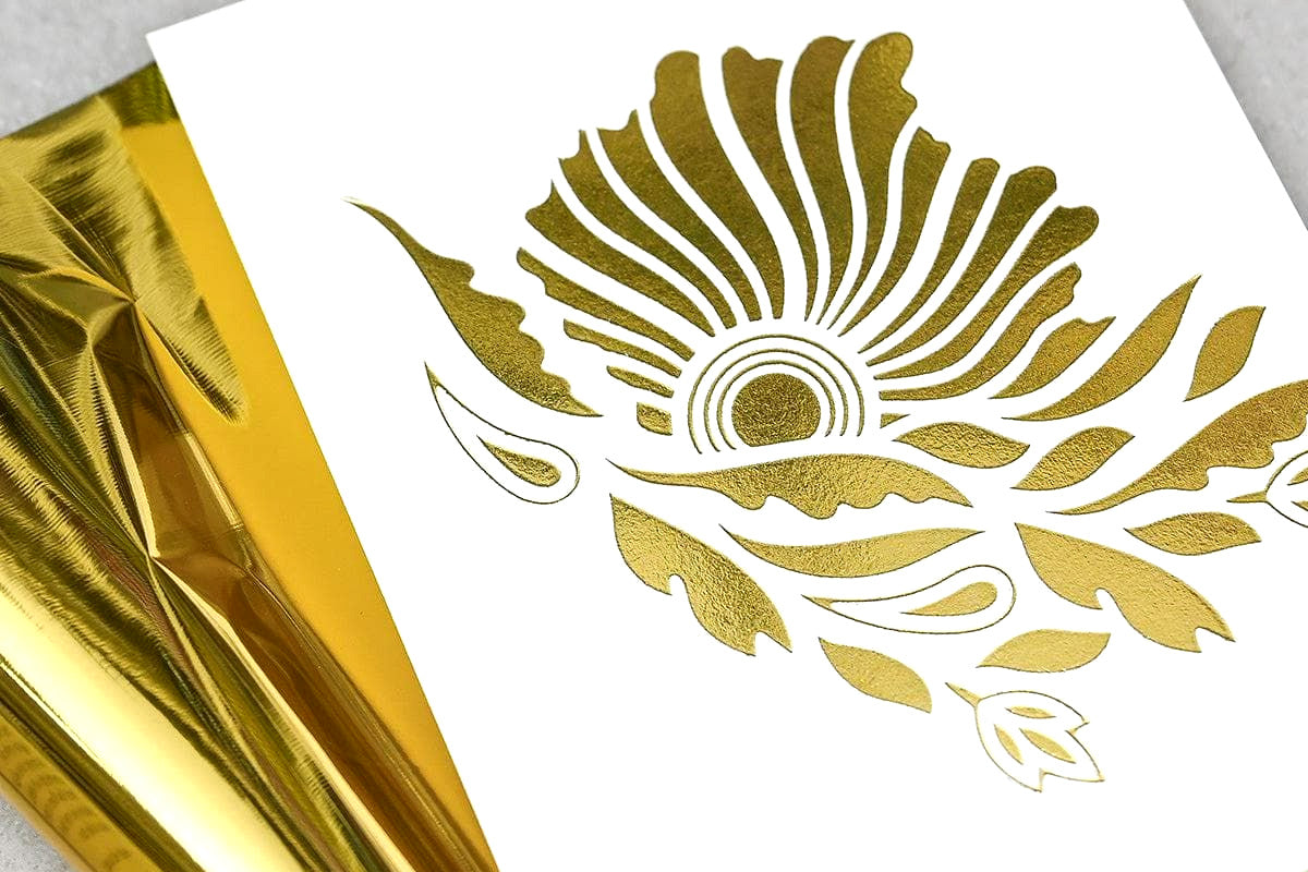 An intricate floral design hot-foiled onto cardstock with the Brushed Gold Hot Foil Roll