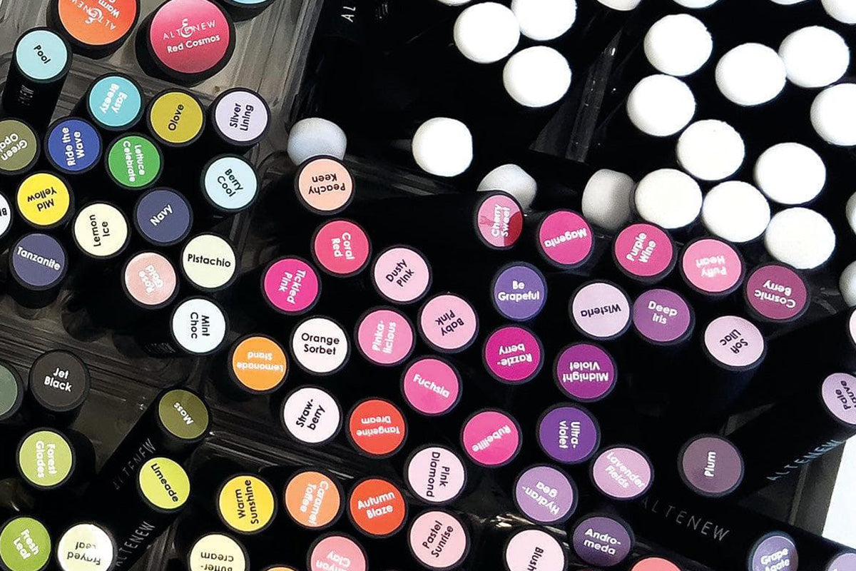Blending brushes labeled with Altenew stickers