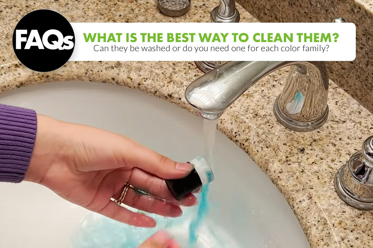 Cleaning a blending brush with running water on a sink