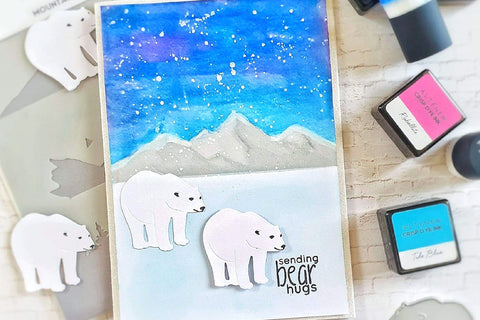 An arctic themed card with polar bear die-cuts, colored in with the help of Altenew's Small Ink Blending Brush