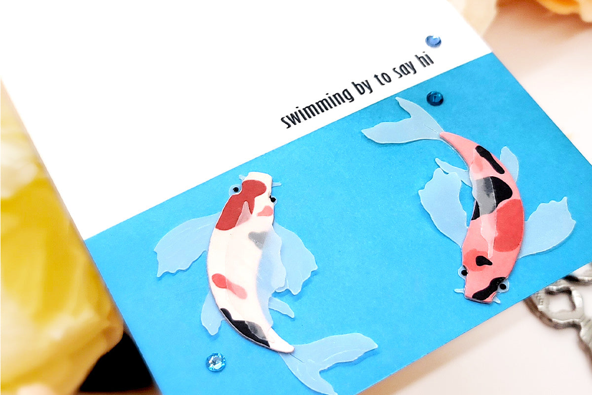 Clean and simple handmade greeting card with koi fish images