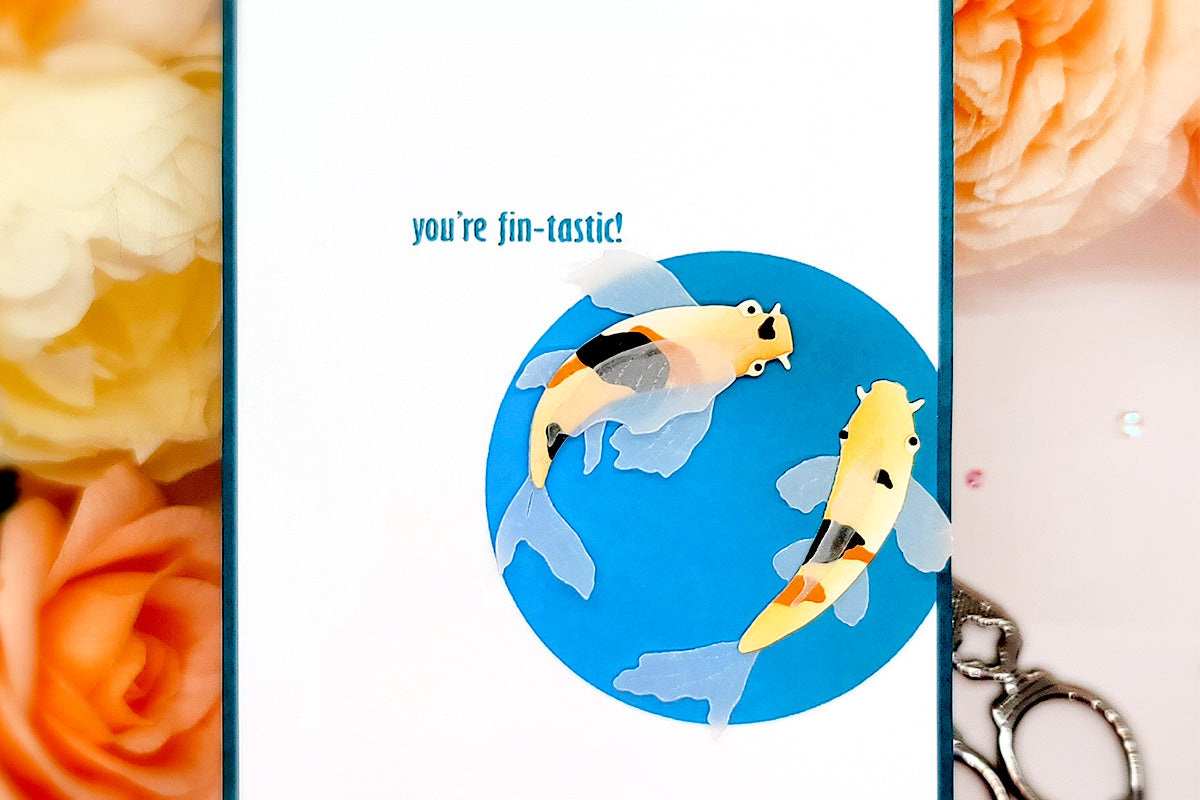 Clean and simple card design with 2 koi fish swimming in blue waters