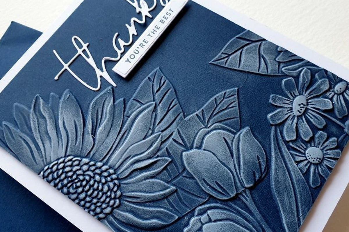 3D embossed flowers on a monochrome thank you card