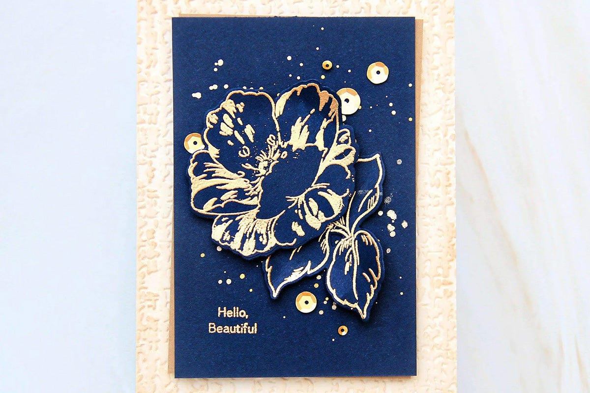 A stunning card with a gold-outlined flower and an embossed background from Altenew's Organic Linen 3D Embossing Folder